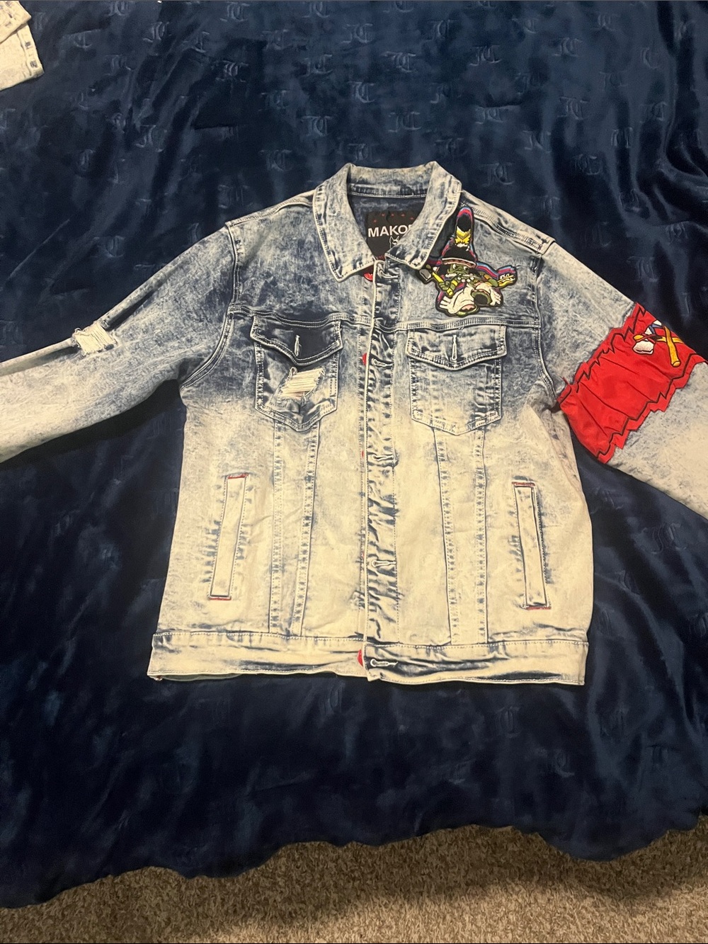 MAKOR Distressed Light Wash Denim Jacket with Red Sleeve Patch